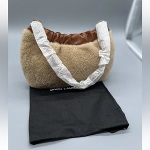 Yves Saint Laurent pac pac shearling chain hobo bag